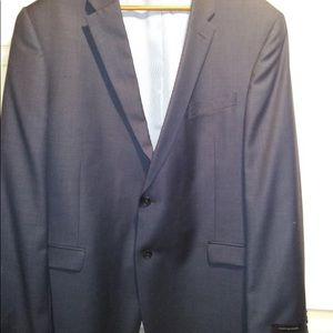 Tommy Hilfiger brand-new never worn with tags 2 button suit. Jacket and pants